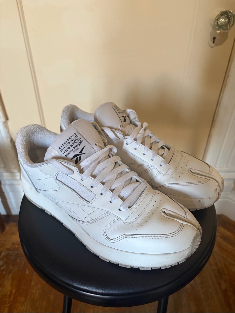 Maison Margiela x Reebok tabi sneakers in white leather.